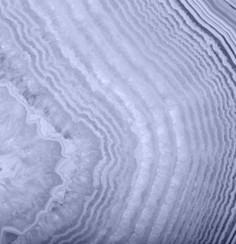 Purple agate stone with layered patterns.