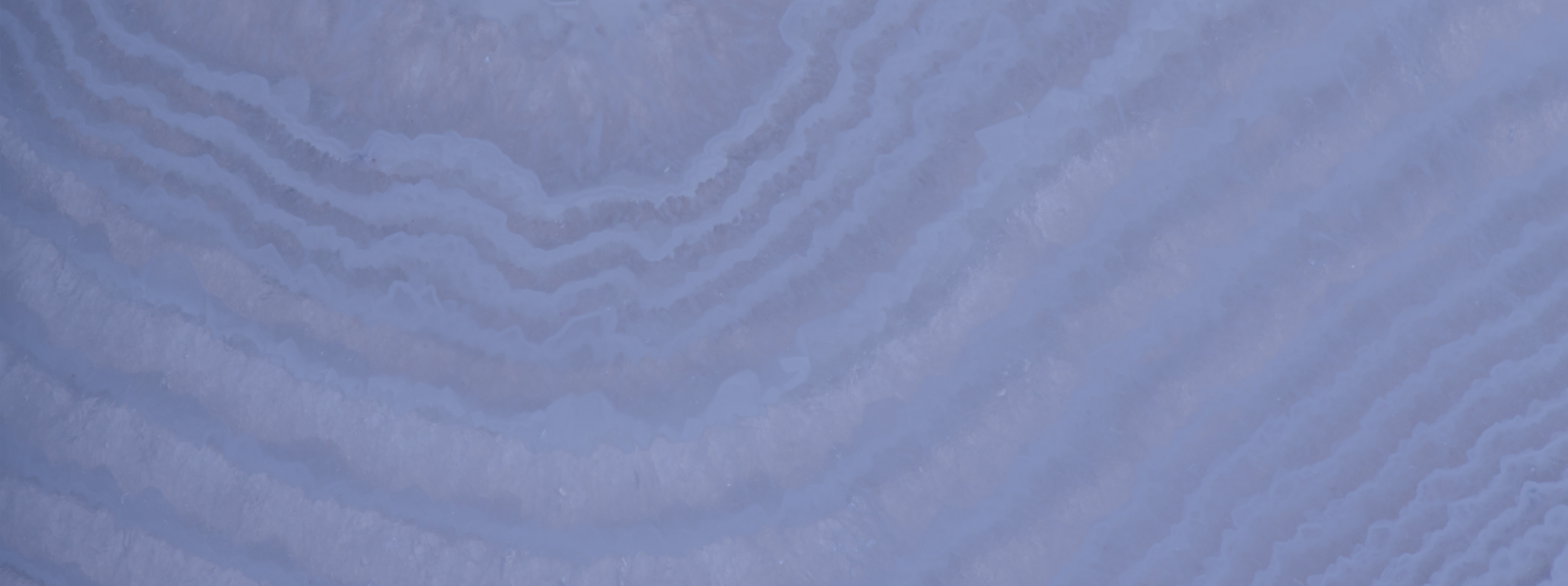 Blue layered mineral or rock texture background.