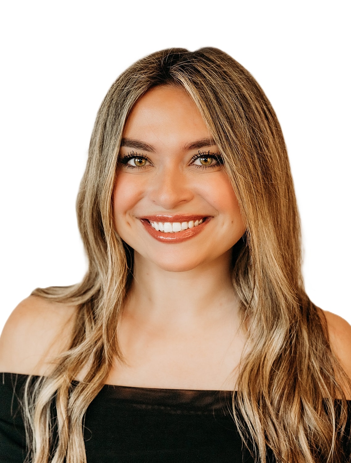 Smiling woman with long hair against white background.