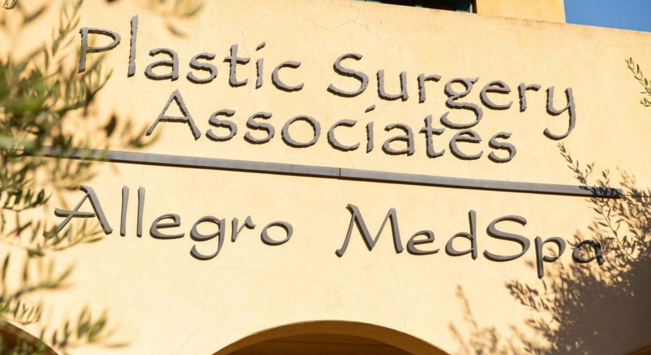 Plastic Surgery Associates and Allegro MedSpa sign