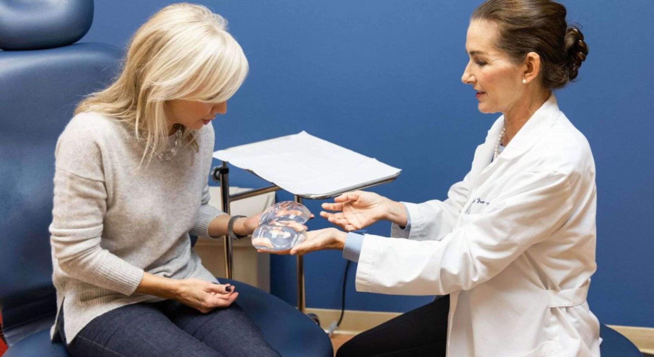 Consultation about medical procedure with patient.