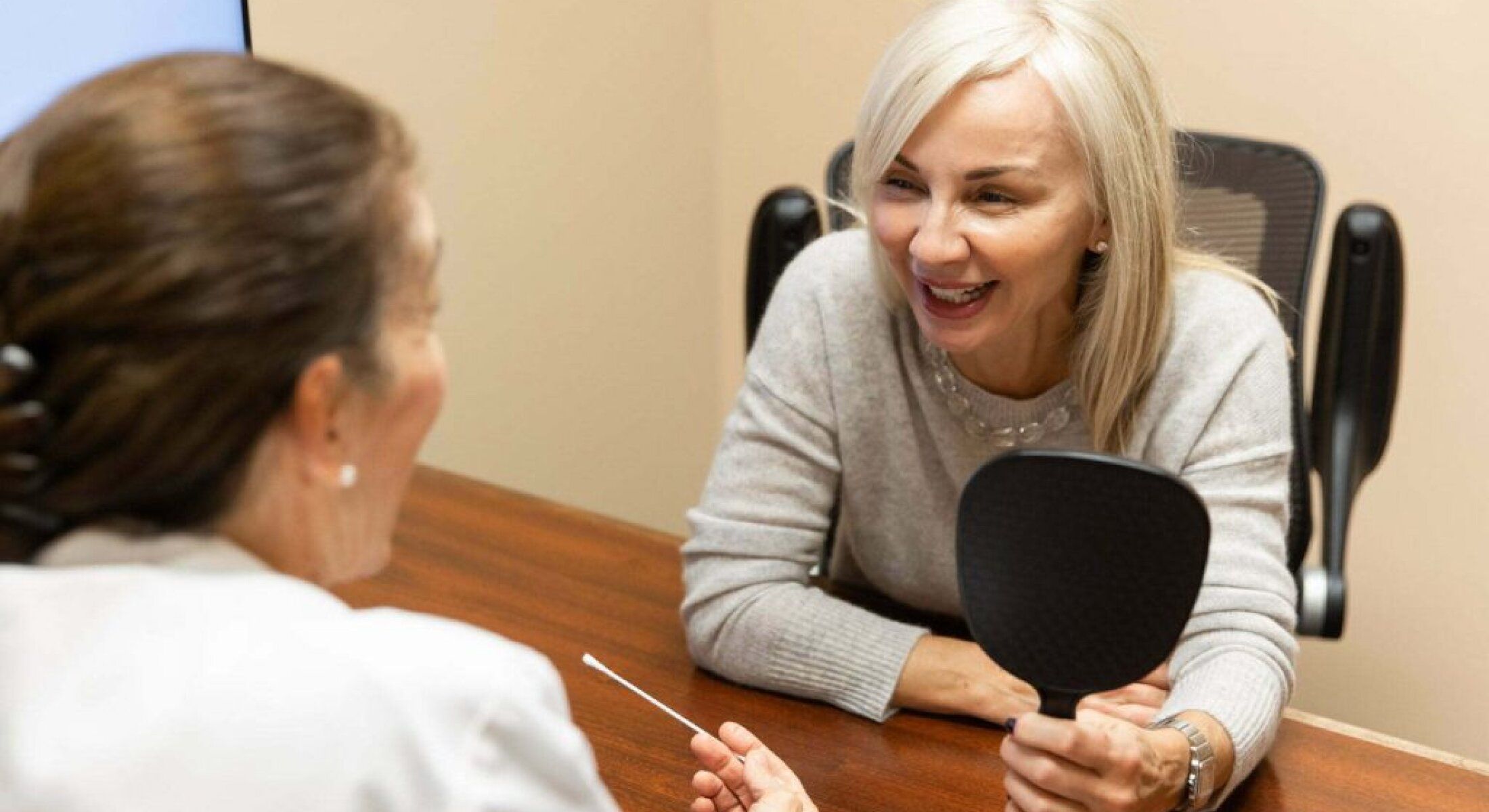 Patient discussing treatment with a medical professional.